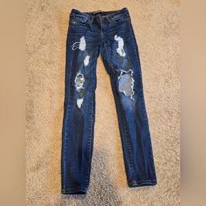 Distressed Blue Jeans